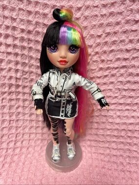 Rainbow High -  Jett Dawson Doll with Long pink and multi colored hair.